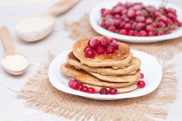 Healthy breakfast concept. Gluten free pancakes from corn and oat flour.
