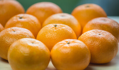 Ripe juicy tangerines. Fruit on the table.