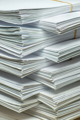 pile of paper documents in the office