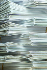 pile of paper documents in the office