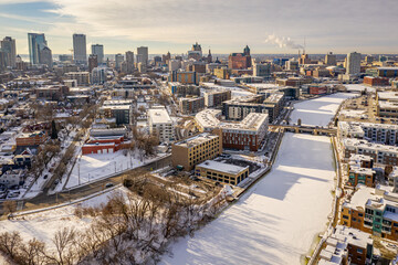 Aerial view of downtown Milwaukee WI taken during winter featuring the Milwaukee River