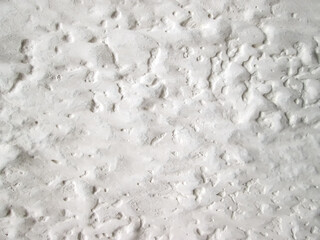 Rough white surface. Light texture of irregularities and roughness.