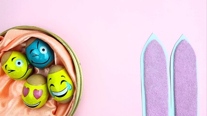 rabbit ears and funny Easter eggs on a light background. an image for celebrating Easter.