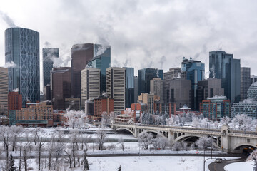 Obraz na płótnie Canvas Calgary's skyline during a cold winter day.