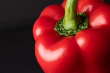 Red bell pepper shot in the studio on a black background