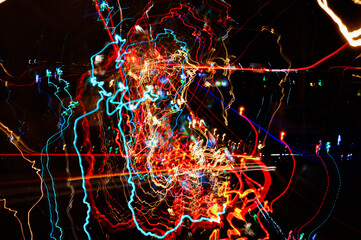 Light tracks of city lights and car headlights