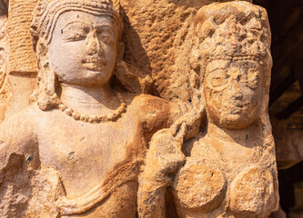Aihole, Karnataka, India - November 7, 2013: Durga Gudi or Temple. Chest and face closeup of...
