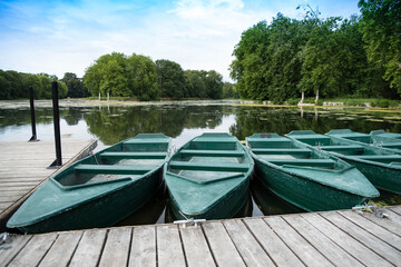 Boats for hire by the lake in France
