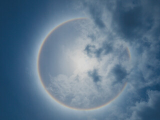 Solar Halo Also known as a 22-degree halo or a sun halo, with the sun in the center of ring is...