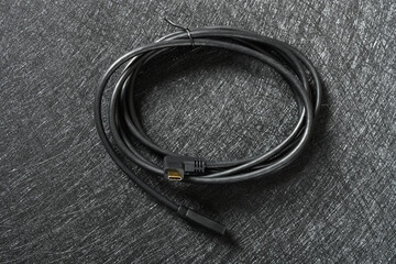 black type C cable on a dark background