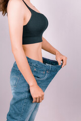 A young woman showing off a slim figure Exercise regularly, be healthy