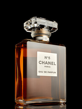 Bottle of perfume Chanel № 5. on black background. Coco Chanel