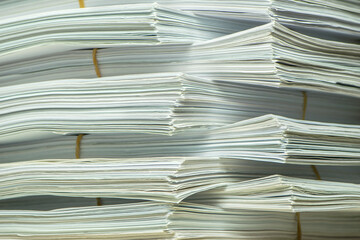 pile of paper documents in the office