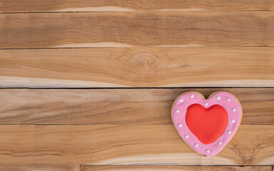 Heart cookies on a wooden background