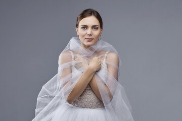 portrait of a beautiful female ballerina. in the studio on a white background