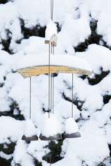 Wind Chimes Covered Snow in Winter