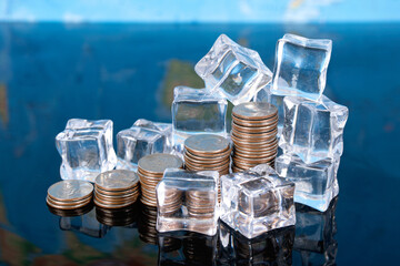 Dollar coins surrounded by ice