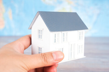 Small house model in hand