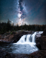 Milky Way Galaxy Above Minnesota Nature Waterfall and Stream in Forest Wilderness, Night Sky Starry Sky Background with Astronomy Concept