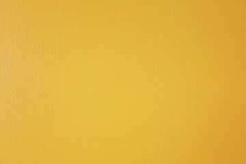 Bright yellow painted concrete wall background image