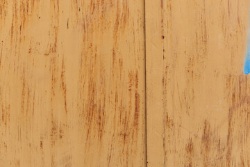 Plate of metal rusty texture with traces of yellow paint faint color corroded with age in Sofia, Bulgaria, Eastern Europe