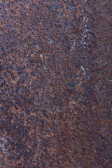 Plate of metal rusty texture with traces of a paint faint color corroded with age in Sofia,...