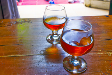 two glass of tea on the wood table