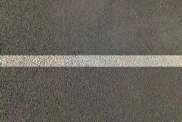Fototapeta premium Road view with lines on white continues lines across Highway for two side traffic movement by dividing lane on highway to control transportation