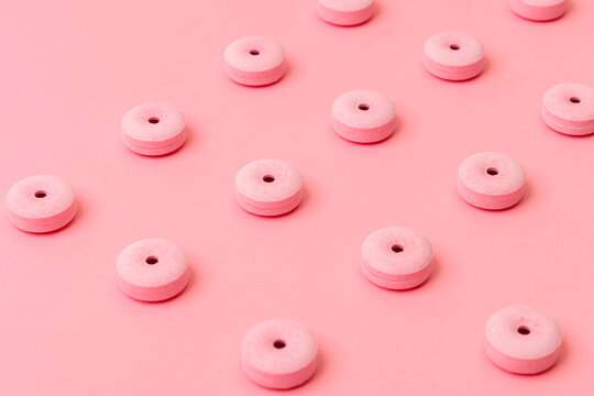 Tablet and pink surface layer. Colorful image.