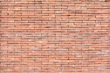 Old vintage retro style bricks wall for brick background and texture.