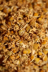 Chamomile dried ready for tee macro background Matricaria chamomilla family asteraceae modern high quality prints