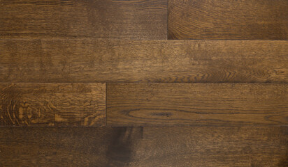 Dark brown wooden parquet panels texture background