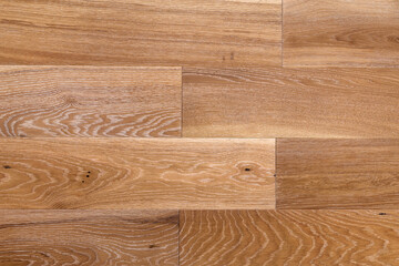 Light brown wooden parquet panels texture background