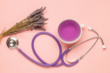 Healthy drink. Lavender tea and stethoscope. Top view. Flat lay. International epilepsy day concept