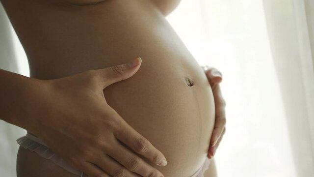 Close up of a cute pregnant belly