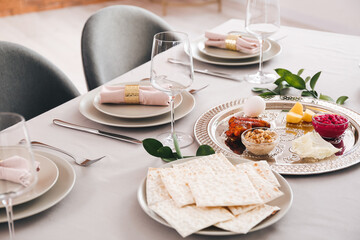 Passover Seder plate with traditional food on served table