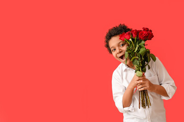 Surprised African-American boy with bouquet of beautiful flowers on color background