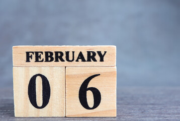Day 6 of february month, Wooden calendar with date. Empty space for text.