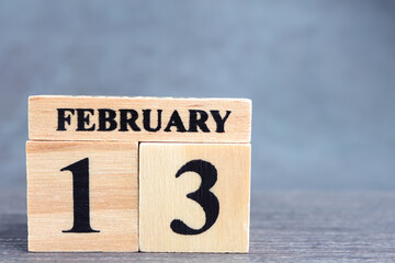 Day 13 of february month, Wooden calendar with date. Empty space for text.