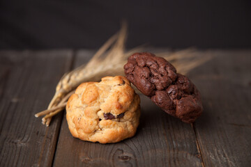 Cookies on a wooden table with wheat ear