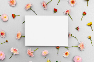 Blank paper with copy space and flower buds