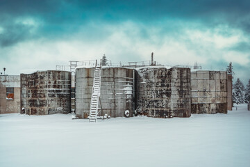 Old oil tanks in winter season