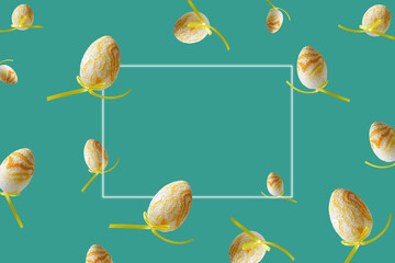 Spring pattern with flying yellow eggs on turquoise background. Zero gravity concept. Hello spring,...