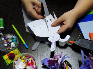 DIY, step-by-step instructions. Step 7. Cut out the grass pattern with scissors to decorate the...