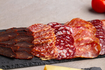 Delicious meat slicing on plate close up