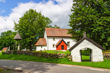 Fototapeta na wymiar Country church by a road in Sweden