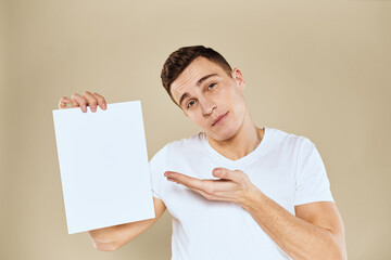 man holding white sheet of paper in hand billboard copy space office