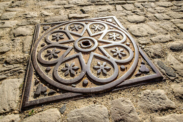 old manhole at a street