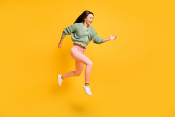 Fototapeta na wymiar Full size profile side photo of young happy excited crazy girl run in air look copyspace isolated on yellow color background