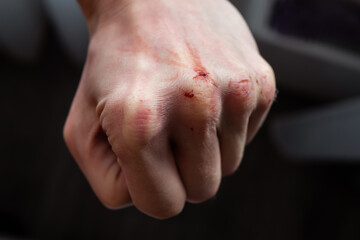 Close-up Of Human Hand Against Gray Background